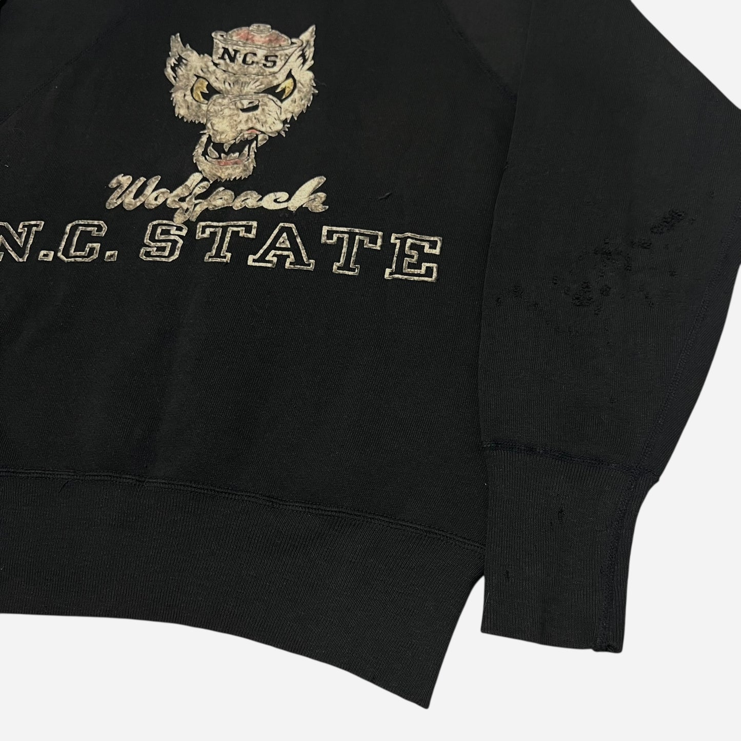 1950s Champion running man NCSU wolf flock print black sweat (M)