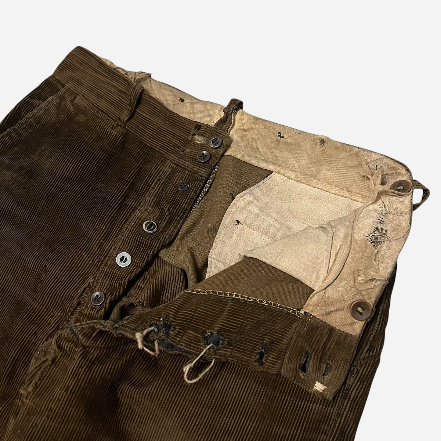 1920s Brown corduroy double button fly heavily repaired pants (32w)