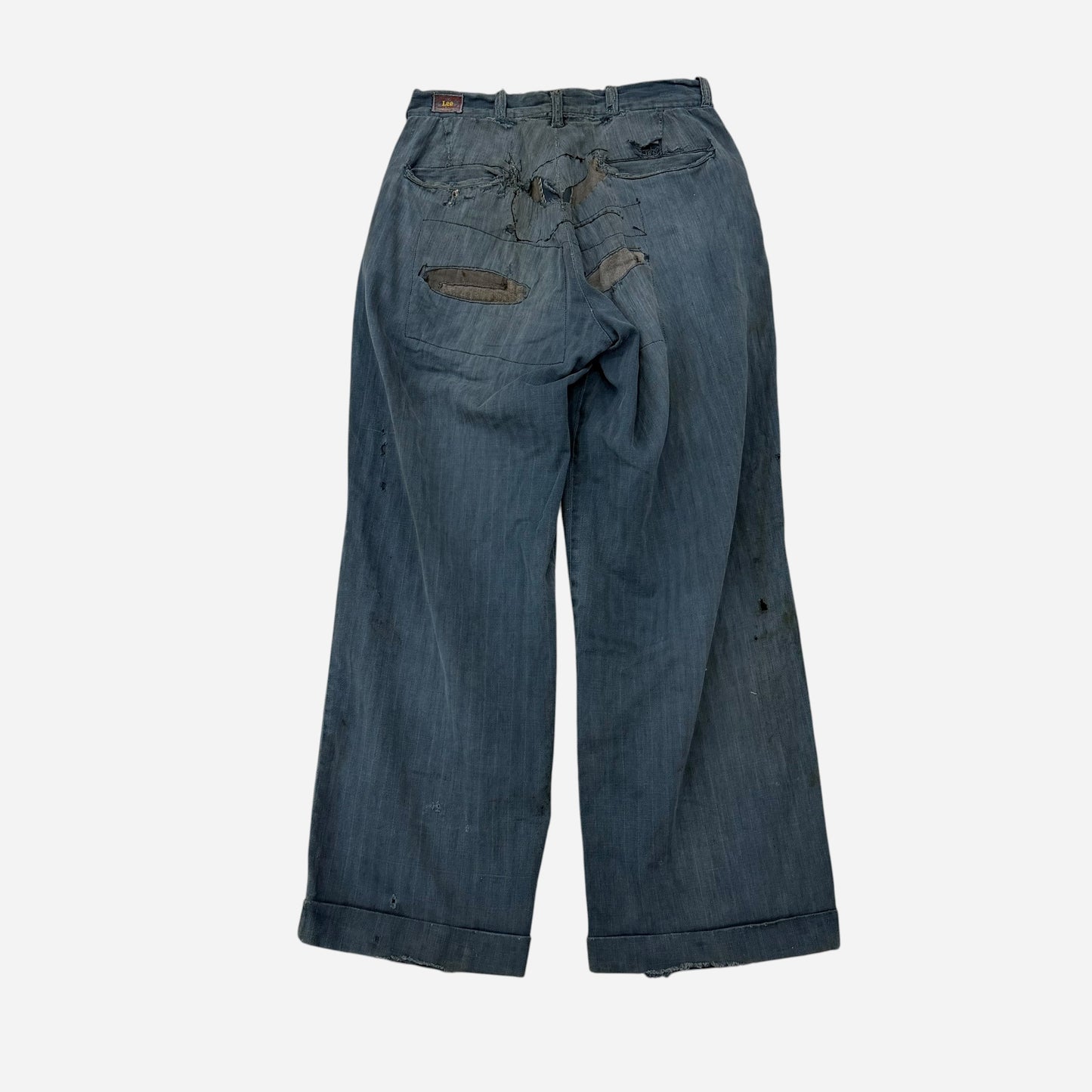 1950s Lee button fly cotton HBT green/blue repaired work pants (28w)