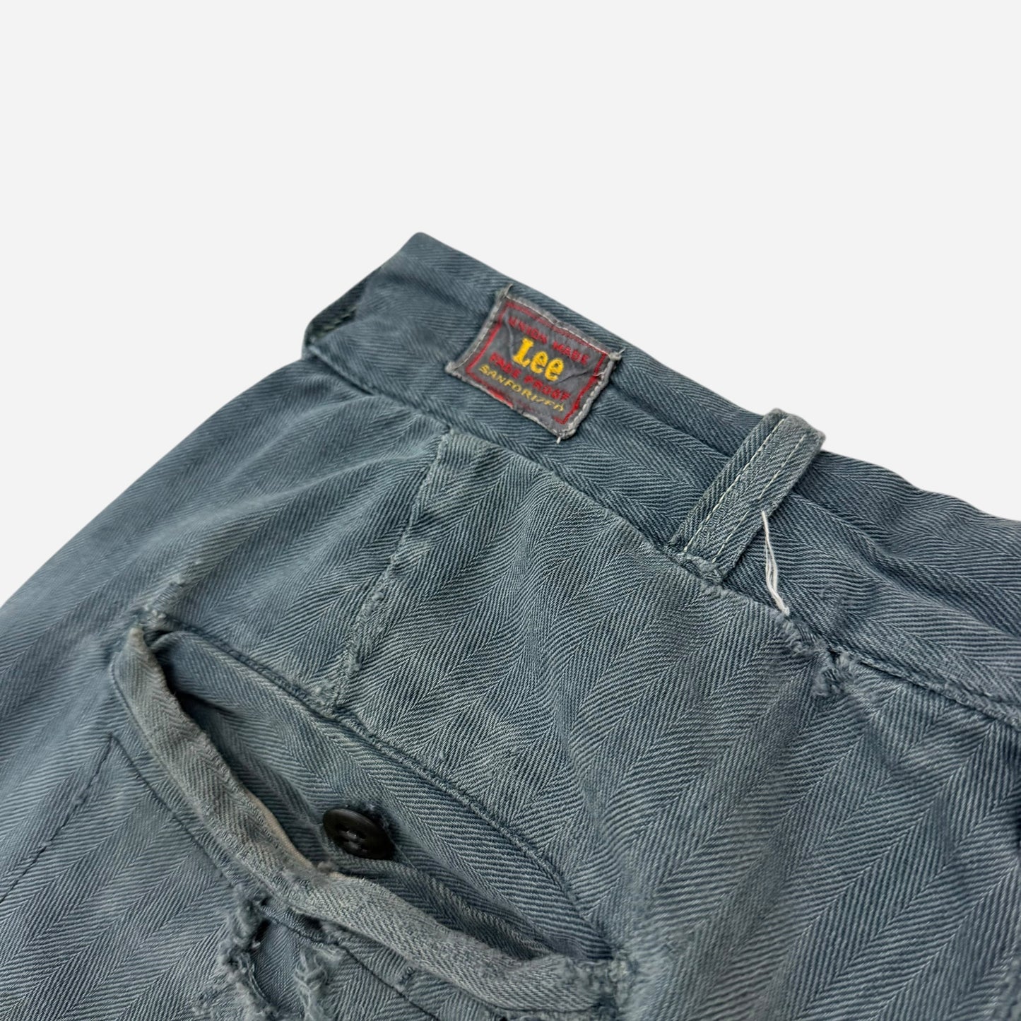 1950s Lee button fly cotton HBT green/blue repaired work pants (28w)