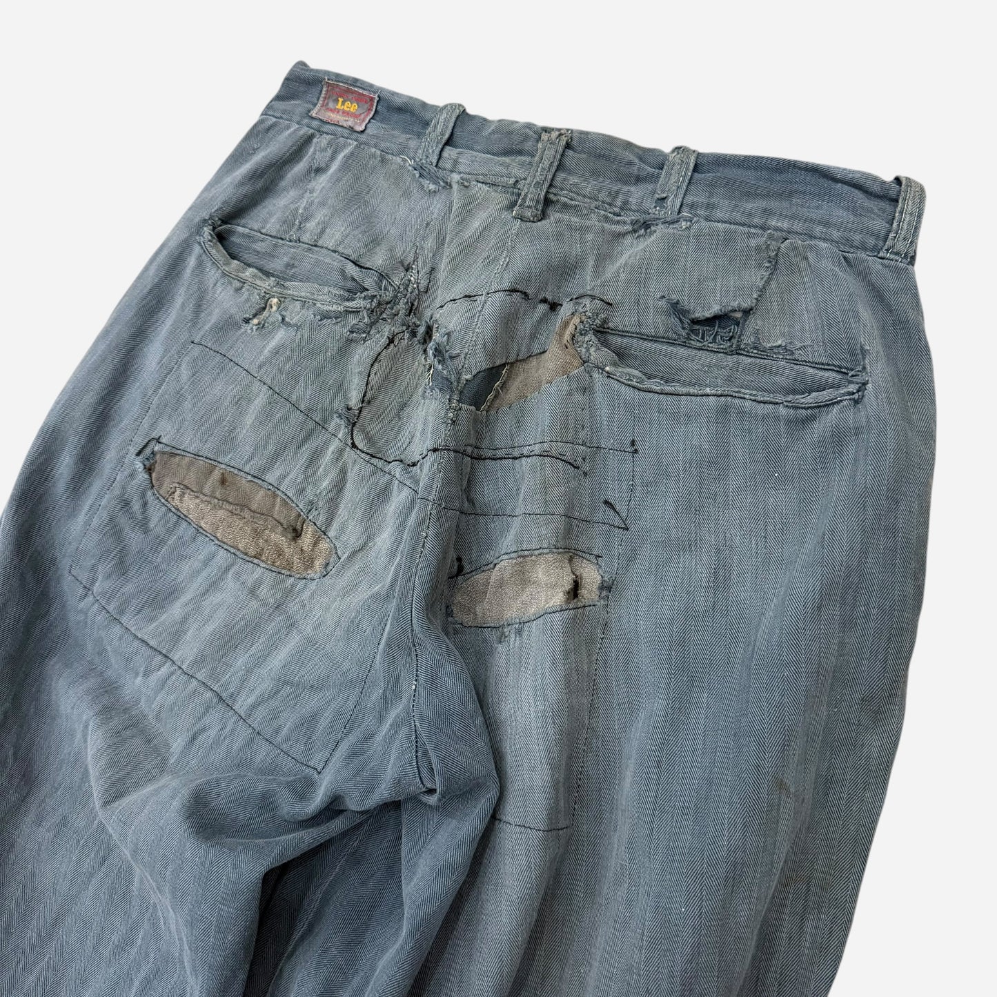 1950s Lee button fly cotton HBT green/blue repaired work pants (28w)