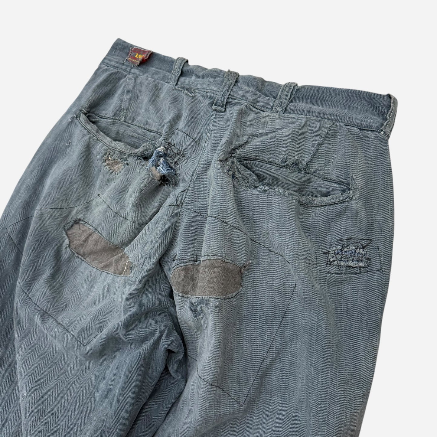 1950s Lee button fly cotton HBT green/blue repaired work pants (28w)