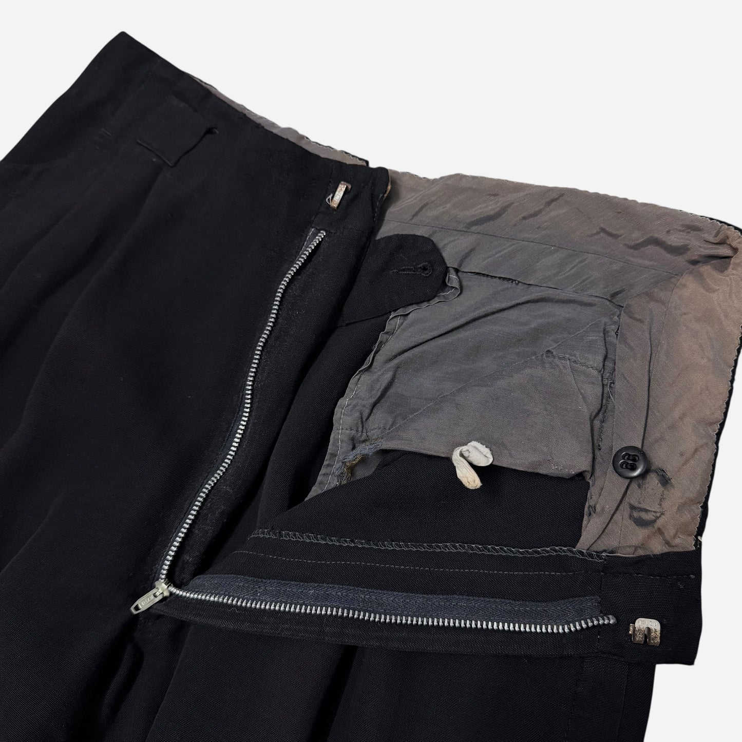 1950s Dan Mar black rayon pleated pants (29w)