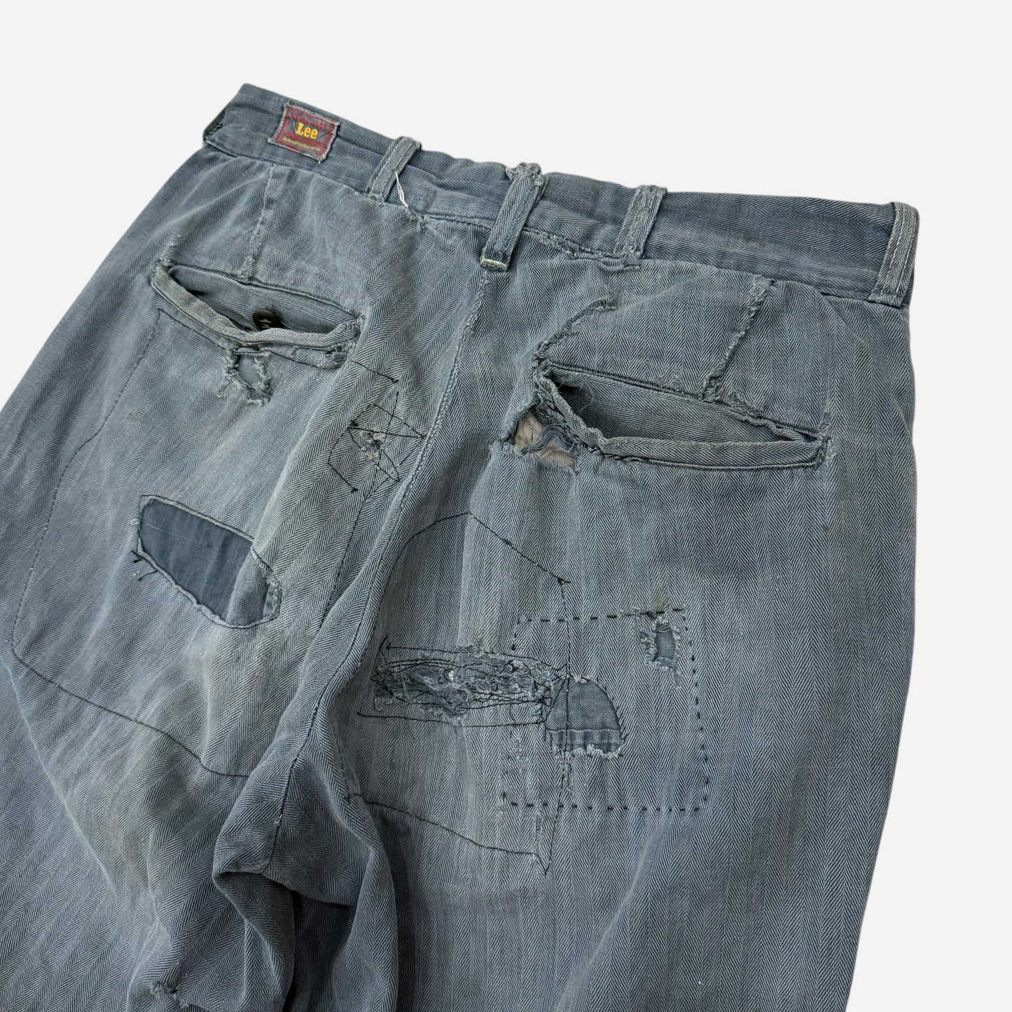 1950s Lee button fly cotton HBT green/blue repaired work pants (28w)